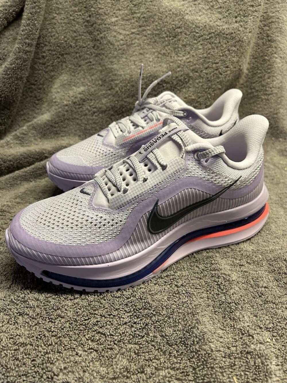 Nike Women's Lavender Running Shoes with Black Swoosh
